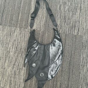 Bat Wing Grommet Black Vegan Leather Shoulder Bag